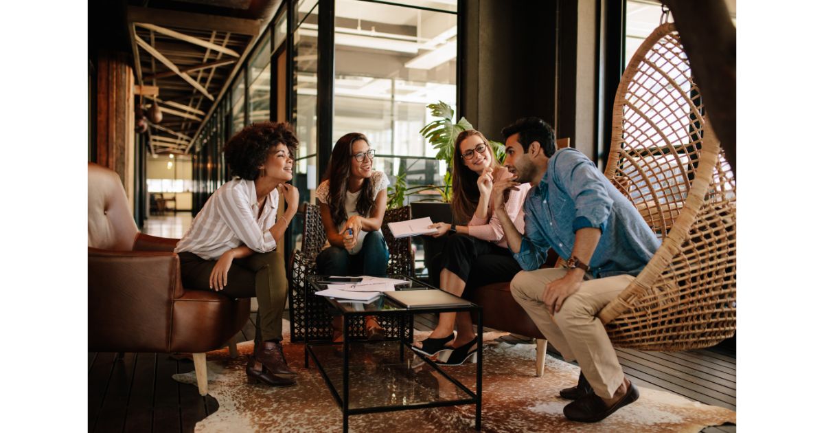 A group of employees discussing about wellness activities