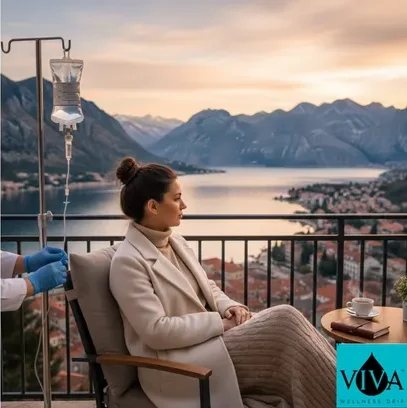A patient enjoying a drip iv Kotor, Montenegro with a view of the ancient bay