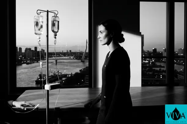 IV drip Rotterdam, Netherlands session in a modern urban setting with port views