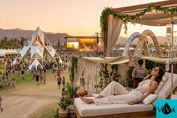 A festival-goer receiving an IV hydration drip Nearby Coachella Area during the Coachella 2026 music festival.
